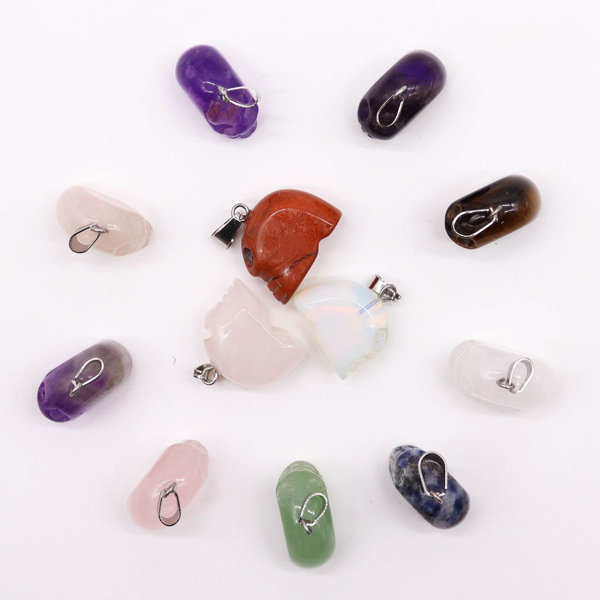 Pingentes mini caveiras - 20x15 mm