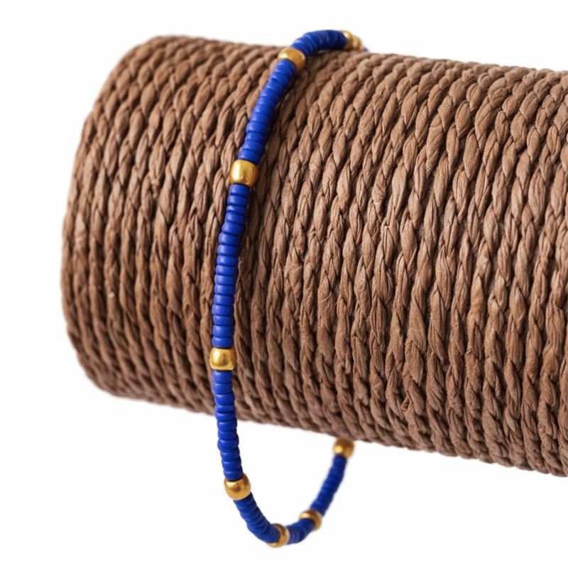 Feines nepalesisches Fußkettchen mit Lapislazuli- und Messingperlenverzierung - (22 cm)